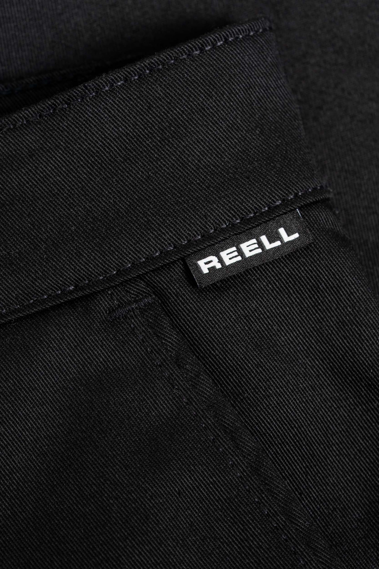 REELL "LOOSE FLEX CHINO" SHORT
